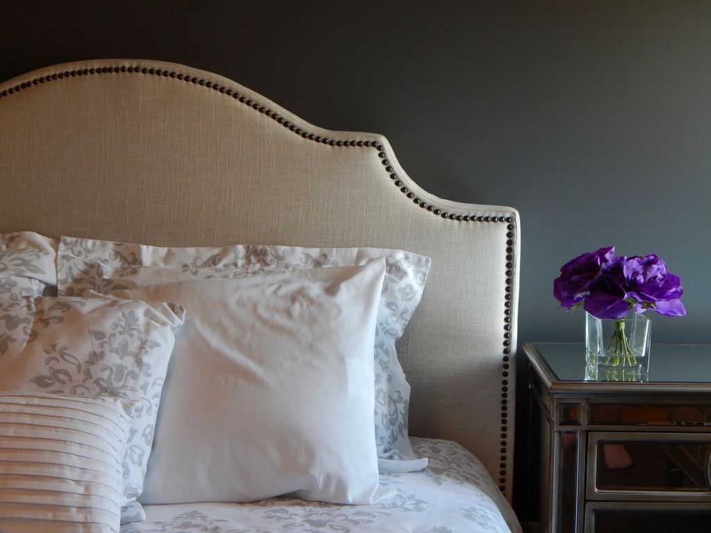 A suite sitting room with a sofa and armchairs